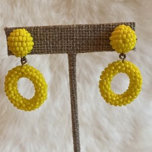 J. Crew earrings in bright yellow.